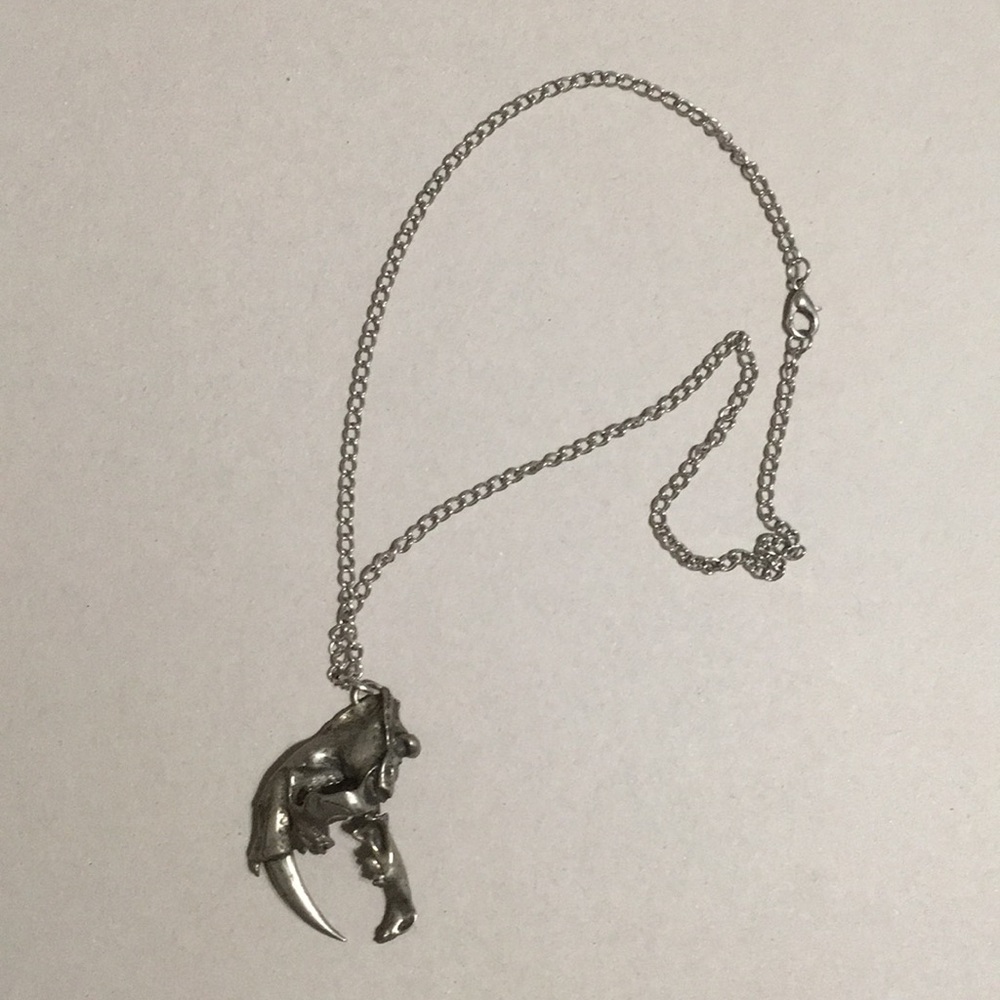 Primordial Profiles Ralph Roberts Sabertooth Skull Stainless Steel Necklace
